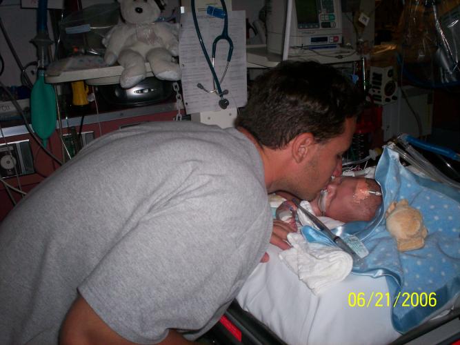 Daddy kissing Peyton